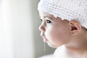 drool falling from baby's mouth